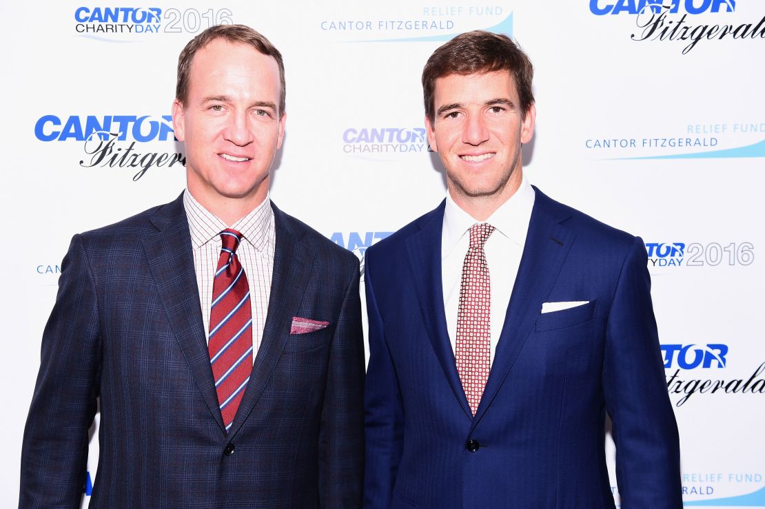 Peyton and Eli Manning attend the Annual Charity Day on September 12, 2016 in New York City. 