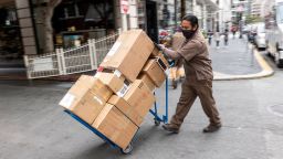 A UPS driver delivers packages in San Francisco, California, U.S., on Monday, July 26, 2021. 