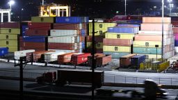 Trucks haul shipping containers at the Port of Los Angeles during nighttime operations on October 25, 2021 in San Pedro, California. The Port of Los Angeles is joining the Port of Long Beach in 24/7 operations amid efforts to ease supply chain issues. Strong consumer demand, coupled with an altered workforce caused by the global pandemic, has contributed to supply chain issues and random shortages of items such as clothing, cars, and toys around the country. 