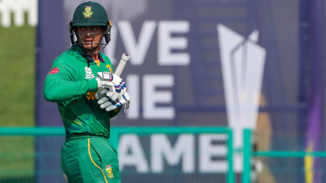 de Kock walks from the field after he was dismissed during the World Cup match between South Africa and Australia.