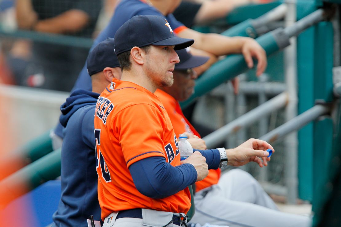 Houston Astros hitting coach Troy Snitker watches from the dugout against the Detroit Tigers.