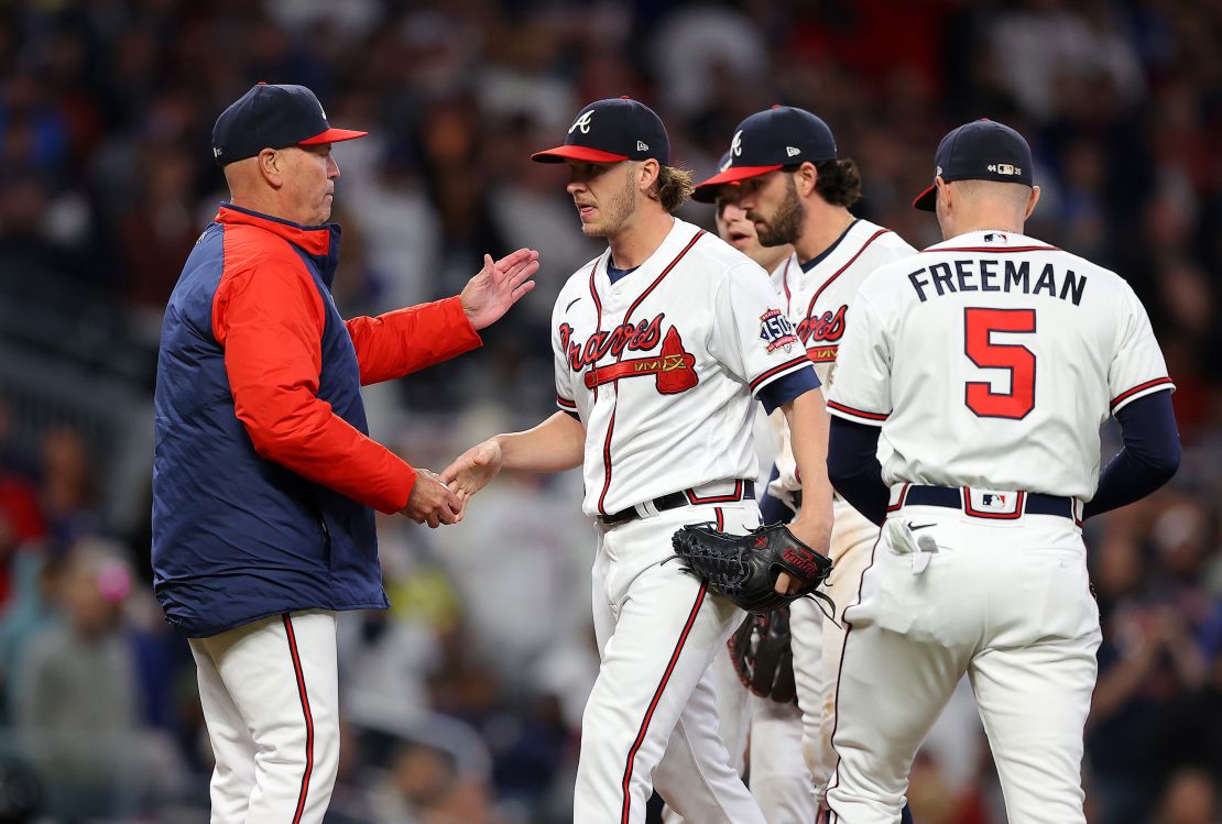 Braves manager Brian Snitker takes out Jacob Webb in the sixth innings of the team's game against the Los Angeles Dodgers.