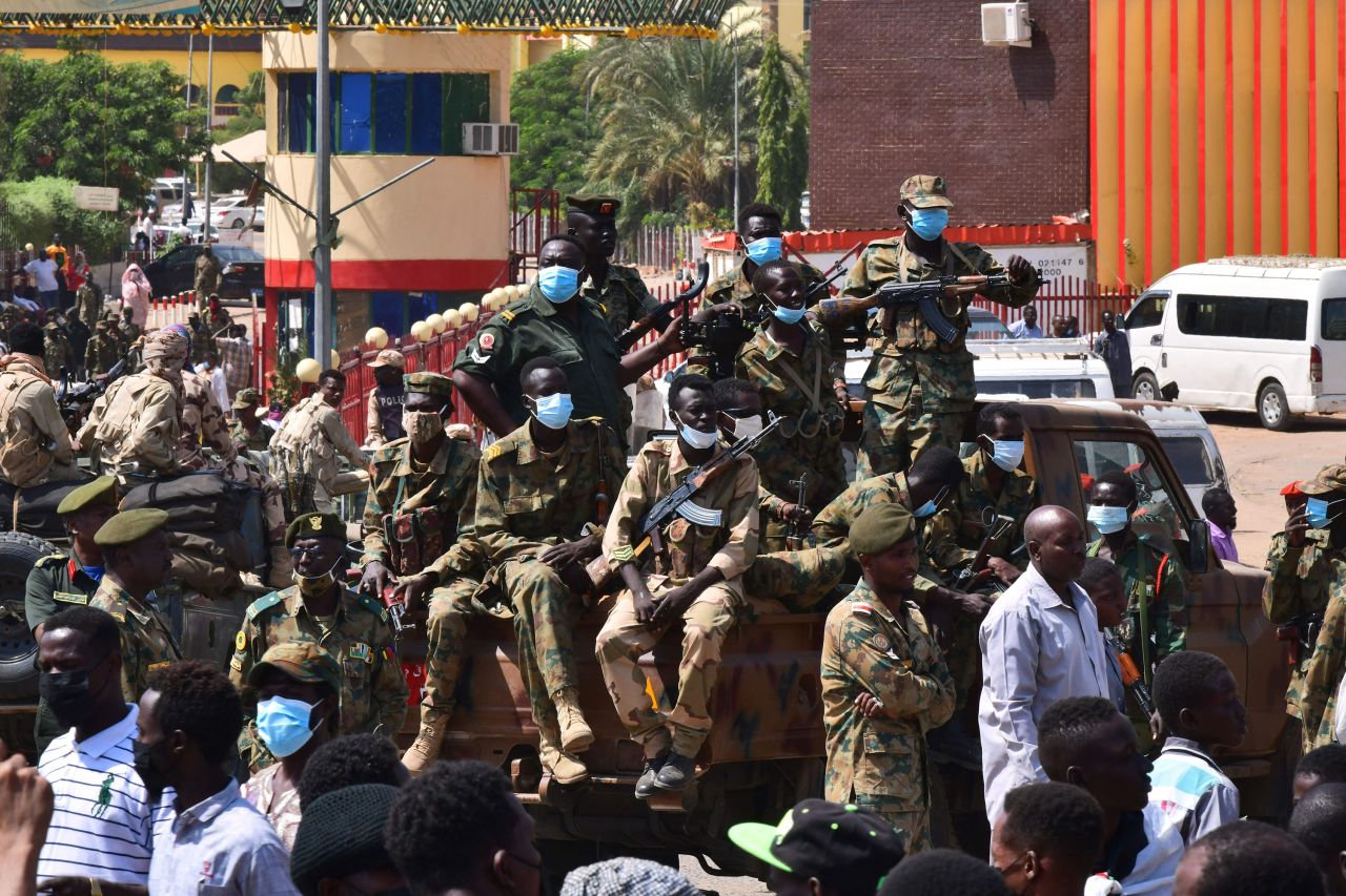 Sudanese security forces guard a military hospital and government offices during anti-coup protests in Omdurman on October 25.