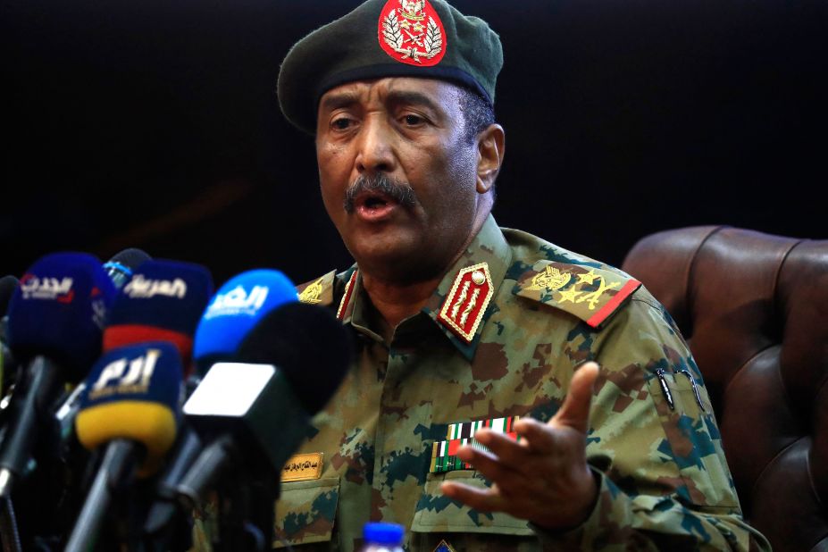 Gen. Abdel Fattah al-Burhan, the head of Sudan's armed forces, speaks during a news conference in Khartoum on October 26. He has said that an "independent and fair representative government" would assume power until one is elected in 2023. Several articles of the constitution have been suspended, he said, and state governors have been removed.