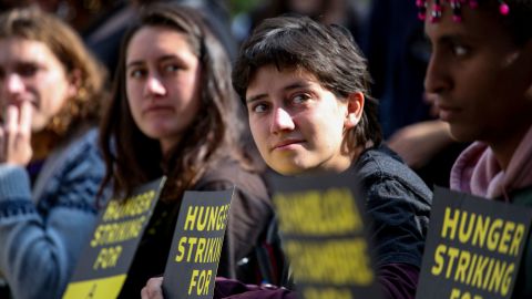 Members of a youth-led hunger strike sit in wheelchairs near the White House on October 22.