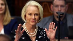 In this Jan. 13, 2020, file photo Cindy McCain, wife of former Arizona Sen. John McCain, waves to the crowd after being acknowledged by Arizona Republican Gov. Doug Ducey during his State of the State address in Phoenix. 