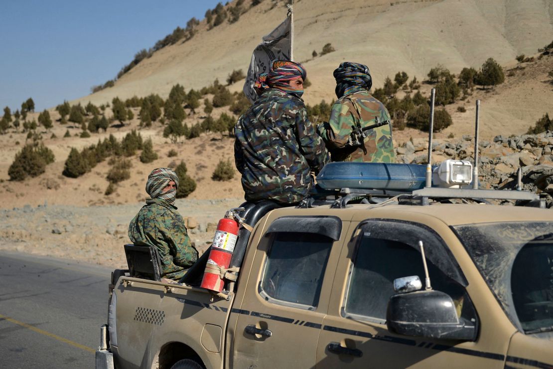 Taliban fighters on a pick-up truck along a road in Band Sabzak area in Badghis province, Afghanistan, on October 17.