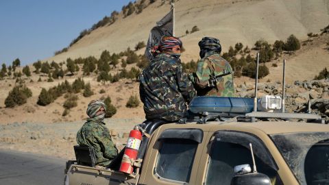 Taliban fighters on a pick-up truck along a road in Band Sabzak area in Badghis province, Afghanistan, on October 17.