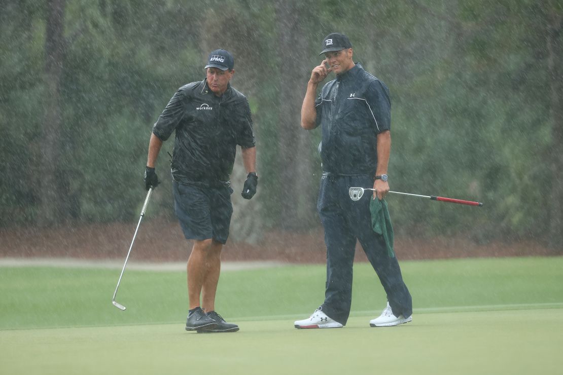 Brady and Mickelson react on the 13th green during 'The Match: Champions For Charity.'