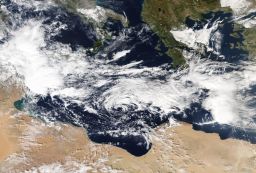 A medicane forms southeast of Italy as shown in this satellite image from October 27, 2021. 