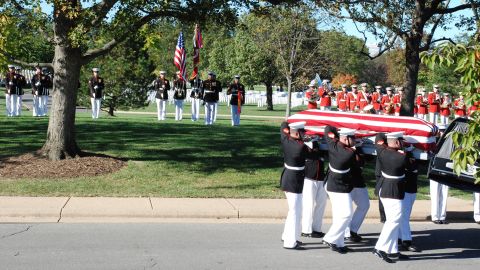 Marines remove Harold Hayden's casket before his funeral at Arlington National Cemetery.