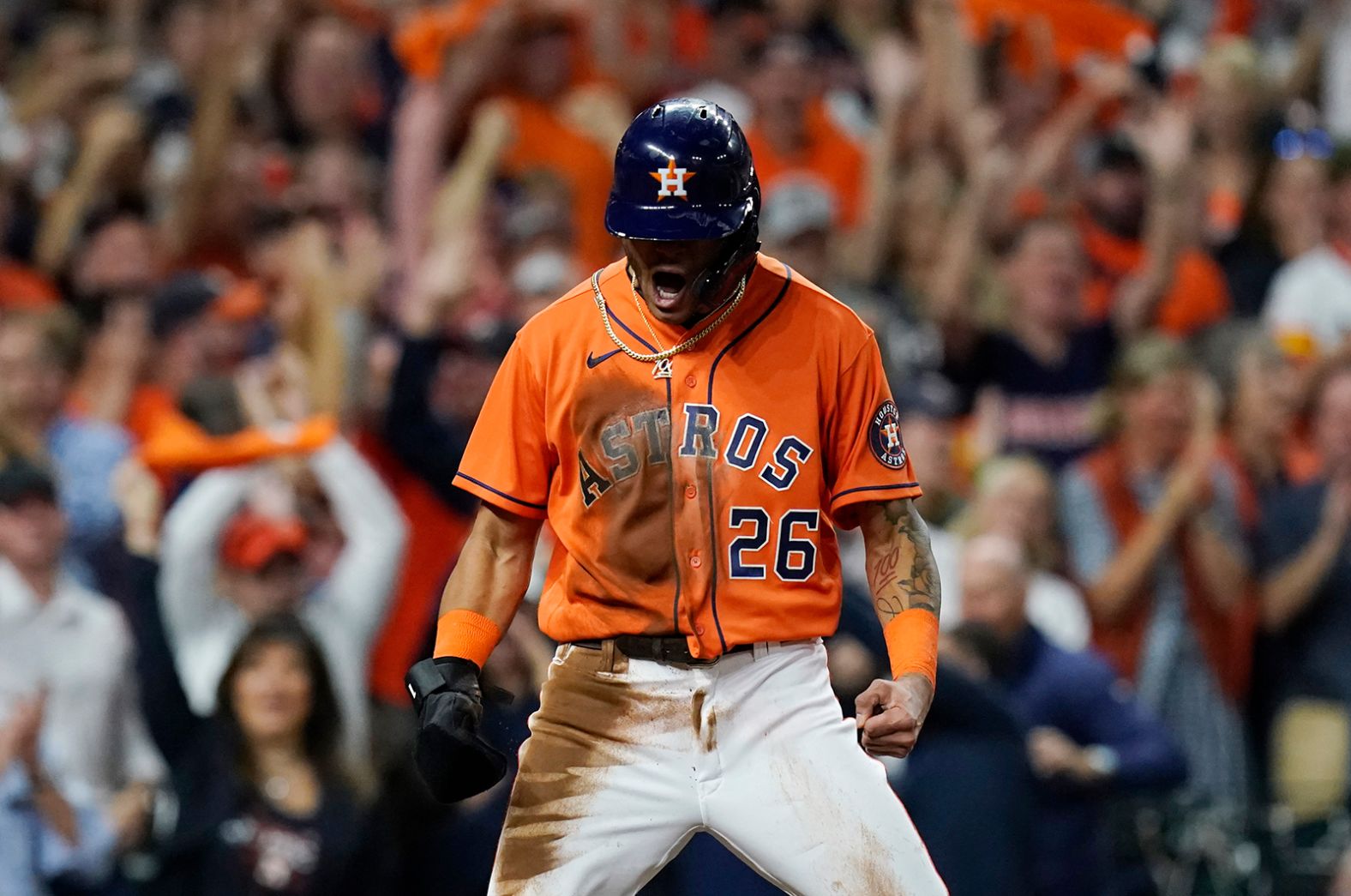 Astros centerfielder Jose Siri celebrates after scoring a run against the Braves in Game 2.