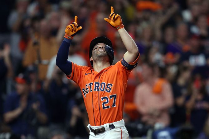 Jose Altuve of the Astros <a href="index.php?page=&url=https%3A%2F%2Fwww.cnn.com%2Fsport%2Flive-news%2Fworld-series-2021-braves-astros-game-2%2Fh_bd32af3e4157b0cee633109cbd8972e5" target="_blank">celebrates after hitting a home run</a> in Game 2.