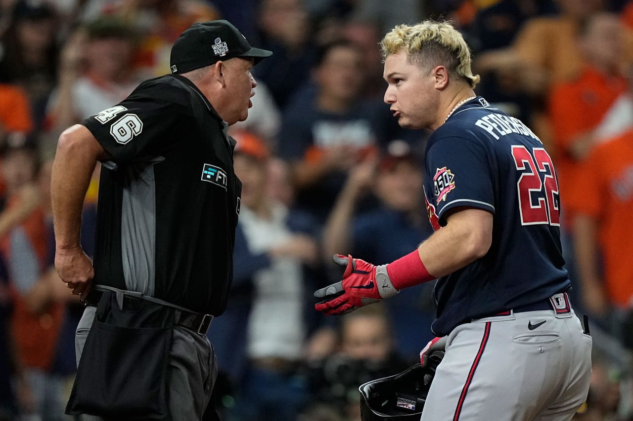 Braves' Joc Pederson argues a call with home plate umpire Ron Kulpa during the eighth inning in Game 2.
