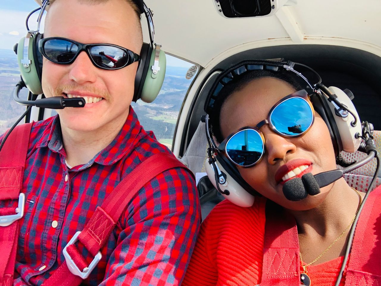 <strong>Love taking flight: </strong>When Sallie Kuria moved from Kenya to Germany in 2010, she met Klaus Müller, who worked in an airport hangar. The day Klaus took Sallie flying marked the beginning of their love story. Here they are flying together in 2020. 