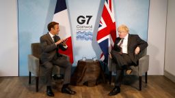Britain's Prime Minister Boris Johnson and France's President Emmanuel Macron take part in a bilateral meeting during the G7 summit in Carbis bay, Cornwall on June 12, 2021. (Photo by Ludovic MARIN / AFP) (Photo by LUDOVIC MARIN/AFP via Getty Images)