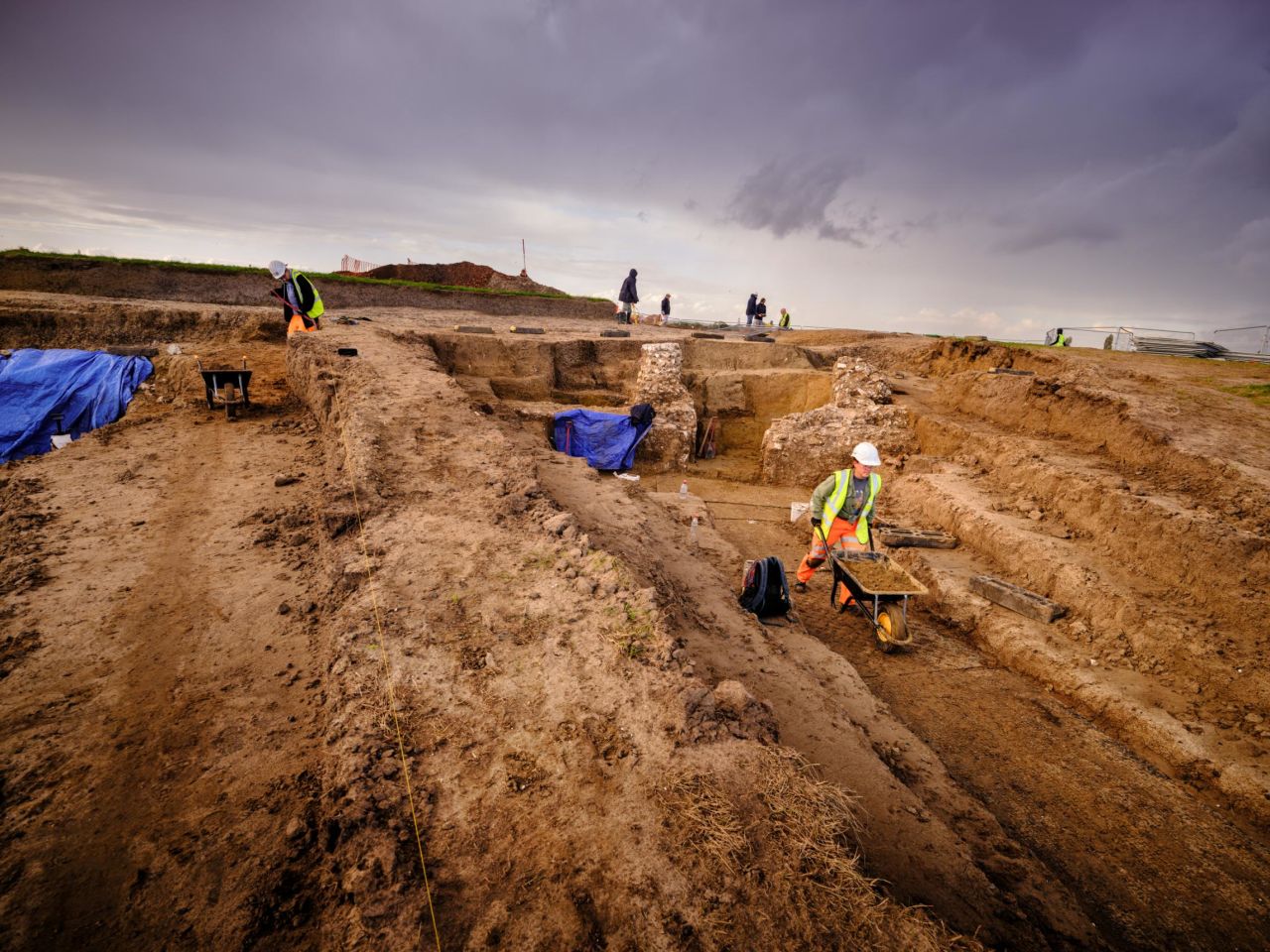 Archaeologists excavating the Roman amphitheater in Richborough, Kent.