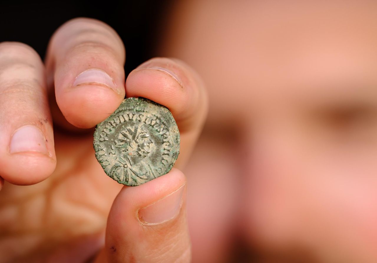 Archaeologists discovered coins, pottery fragments and even a cat skeleton.