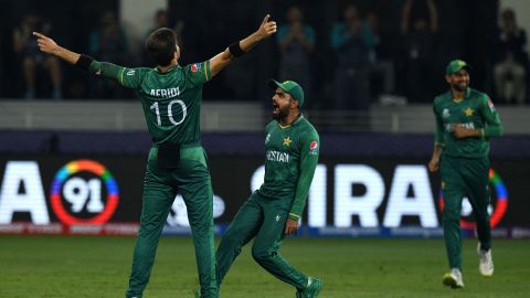 Pakistan's Shaheen Shah Afridi (L) celebrates with his captain Babar Azam (C) during the ICC men's Twenty20 World Cup cricket match between India and Pakistan in Dubai.