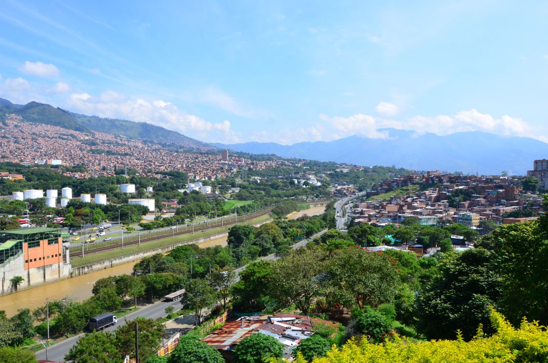 A view from the top of El Morro looks across Rio Medellín and the tram station.