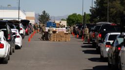 Texas National Guard soldiers distribute food at the El Pasoans Fighting Hunger Food Bank, Wednesday, April 22, 2020, in El Paso, Texas. 