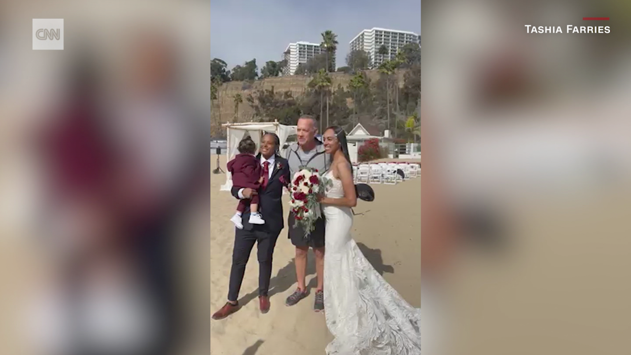 Tom Hanks (center) crashed a wedding in 2021.