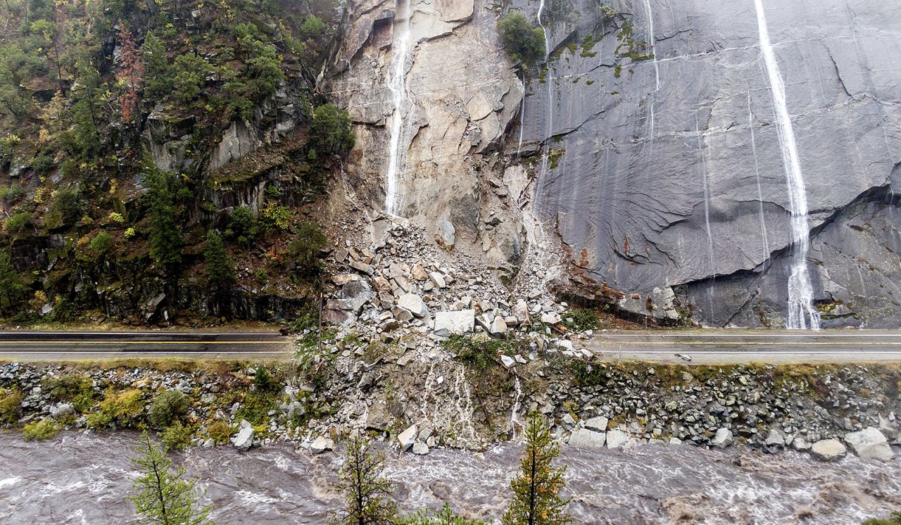 Rocks and vegetation cover Highway 70 following a landslide in Plumas County, California, on Sunday, October 24. <a href="http://www.cnn.com/2021/10/24/weather/gallery/west-coast-bomb-cyclone-atmospheric-river/index.html" target="_blank">Heavy rains blanketing Northern California</a> created slide and flood hazards in land that had been scorched by wildfires.