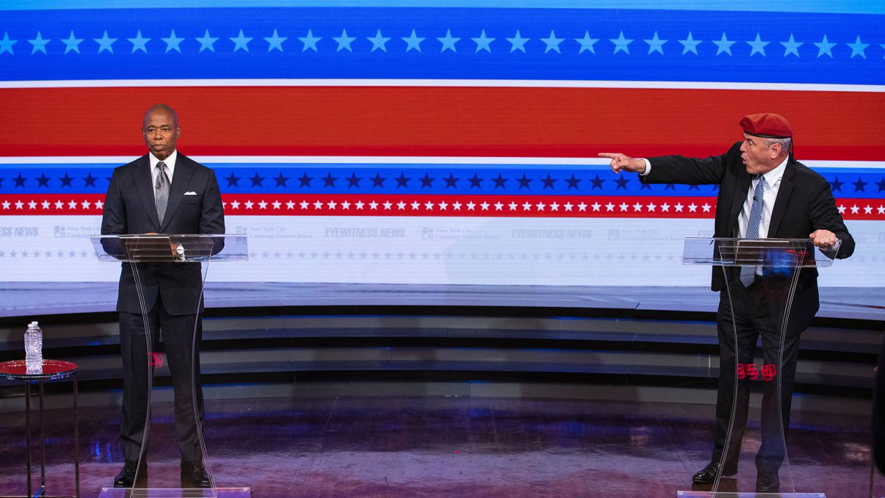 Republican Curtis Sliwa points at Democrat Eric Adams during their <a href="https://www.cnn.com/2021/10/20/politics/new-york-mayor-debate-eric-adams-curtis-sliwa/index.html" target="_blank">mayoral debate in New York</a> on Tuesday, October 26.