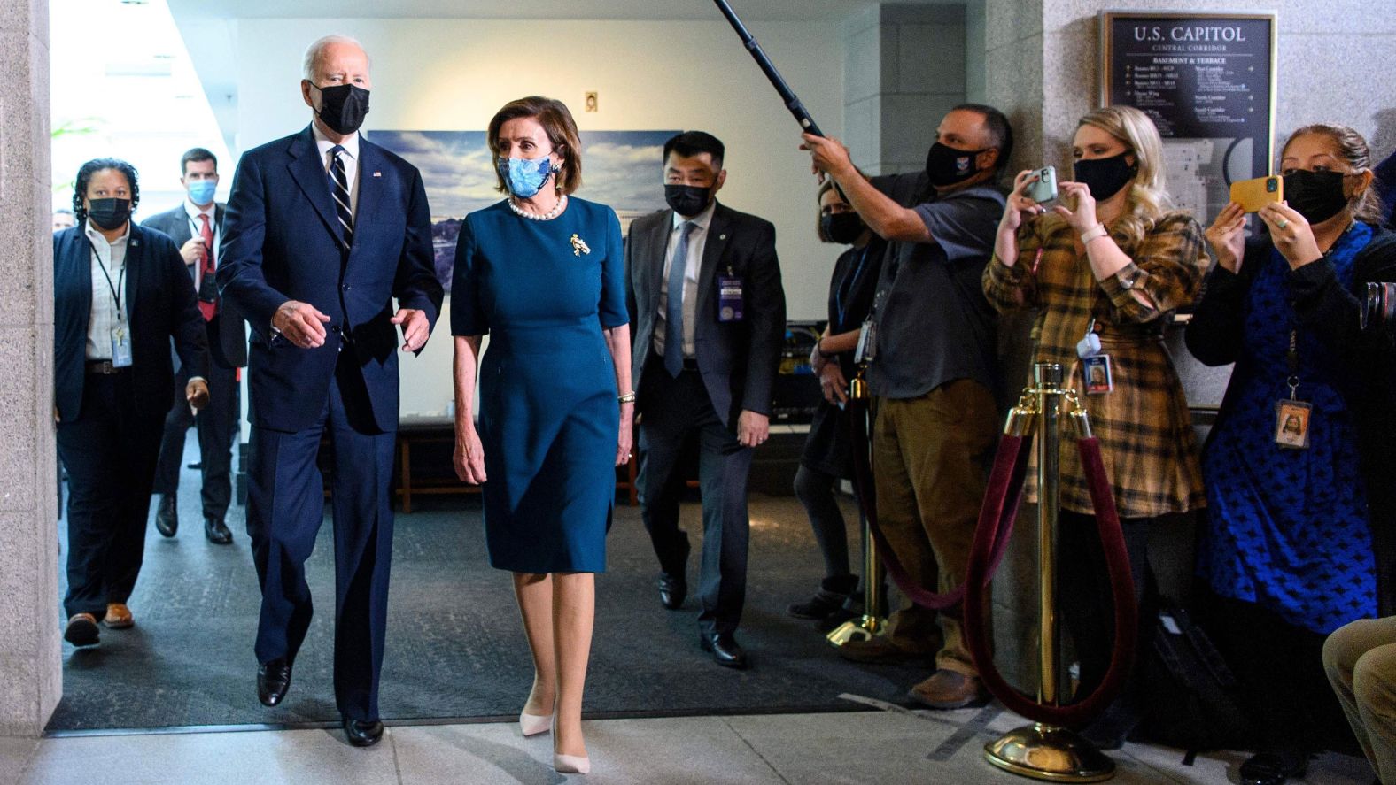 Biden and House Speaker Nancy Pelosi depart following a meeting with the House Democratic Caucus in October 2021. Biden was at the Capitol to <a href="index.php?page=&url=https%3A%2F%2Fwww.cnn.com%2F2021%2F10%2F28%2Fpolitics%2Fbiden-agenda-deal-democrats%2Findex.html" target="_blank">lay out the framework of his economic plan</a> and make his case for it.