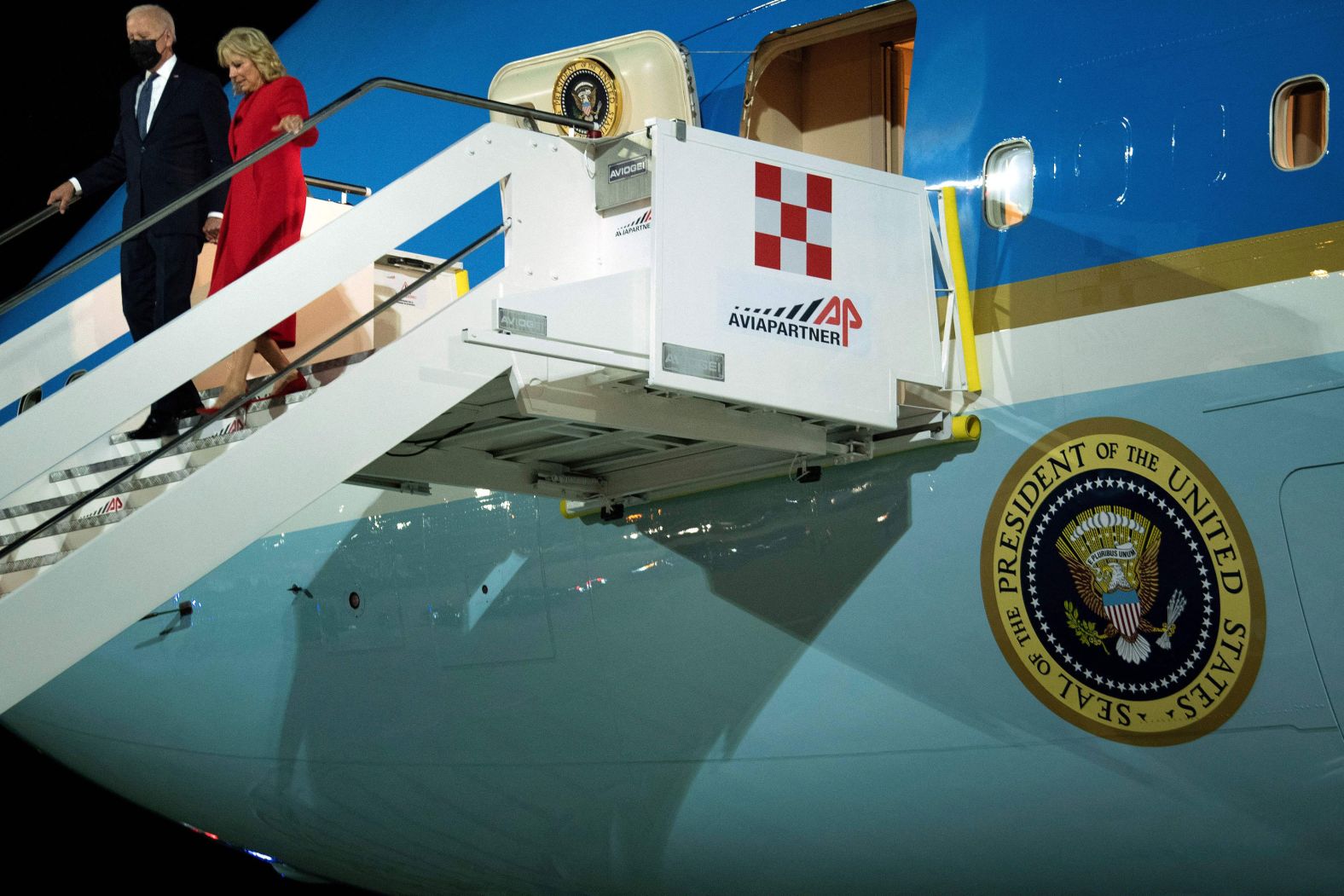 The Bidens disembark from Air Force One after arriving in Italy.