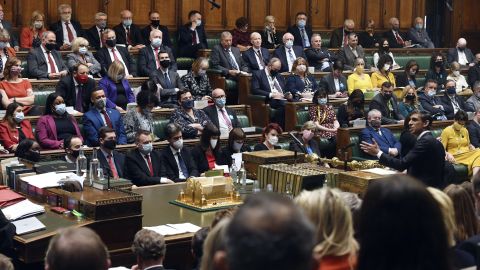 Britain's lawmakers wore masks in the House of Commons last week, after the health secretary encouraged them to 'play their part' in curbing Covid-19 transmission. Few MPs were spotted in face coverings before last week.