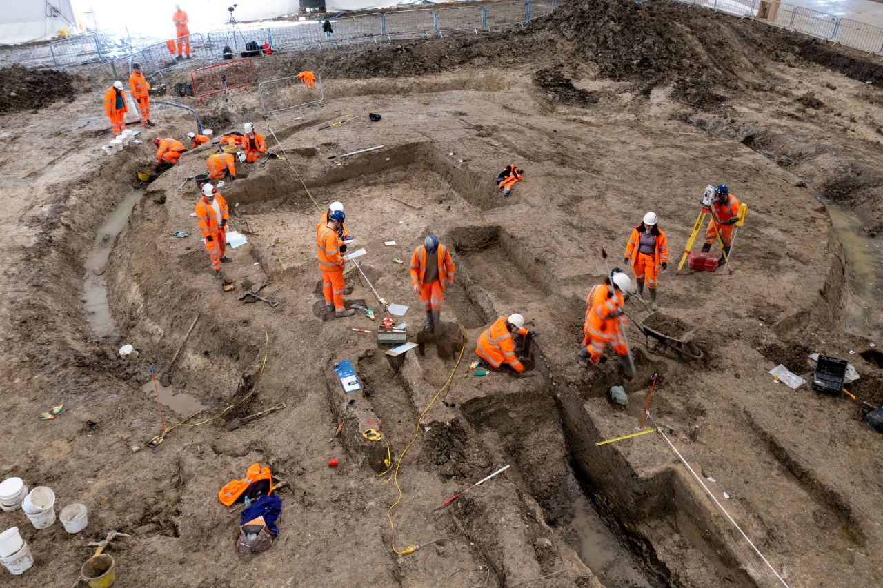 HS2 archaeologists excavating Roman artefacts.