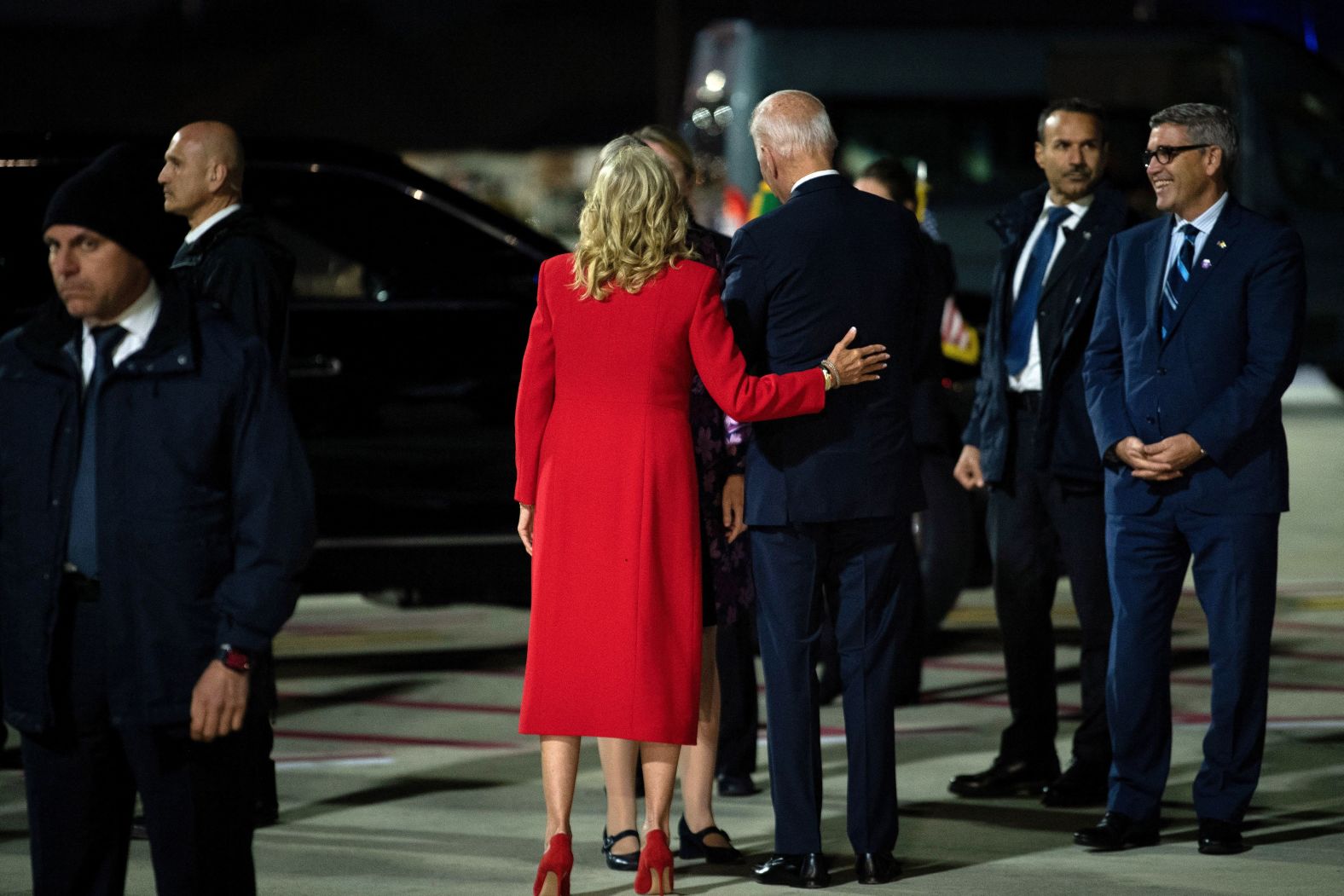 The Bidens are greeted Friday by officials upon their arrival at the Rome-Fiumicino International Airport.