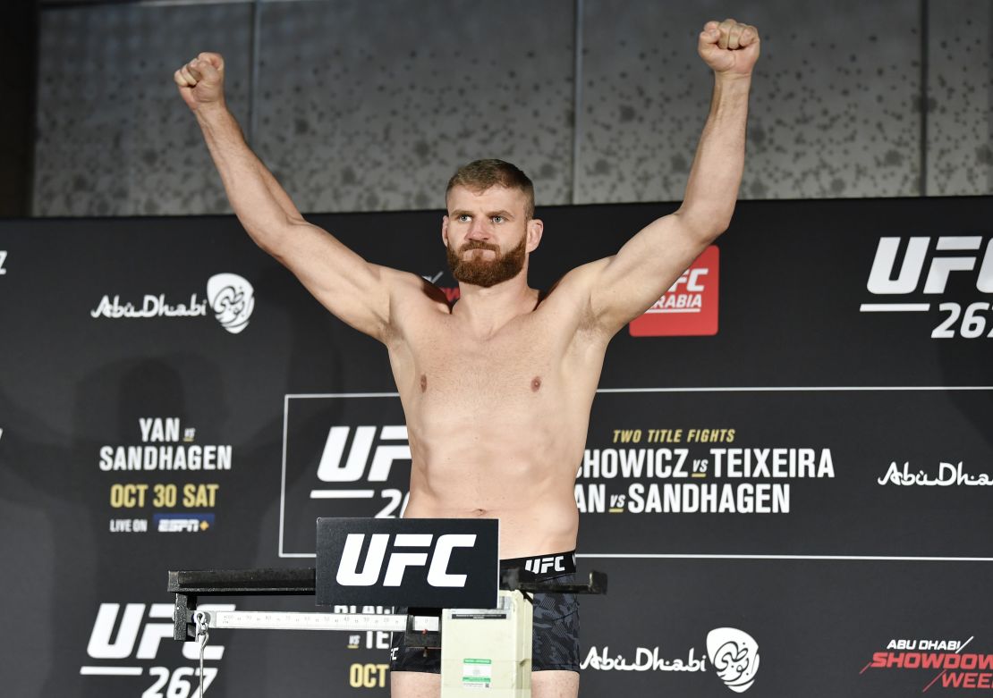 Blachowicz poses on the scale during the UFC 267 weigh-in.