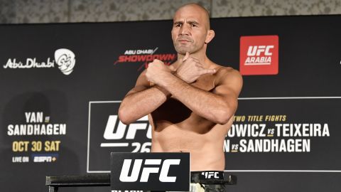 Teixeira poses on the scale during the UFC 267 weigh-in.
