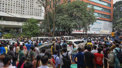 Fans of Kannada cinema actor Puneeth Rajkumar wait outside a private hospital after news of his admission in Bangalore on October 29, 2021.
