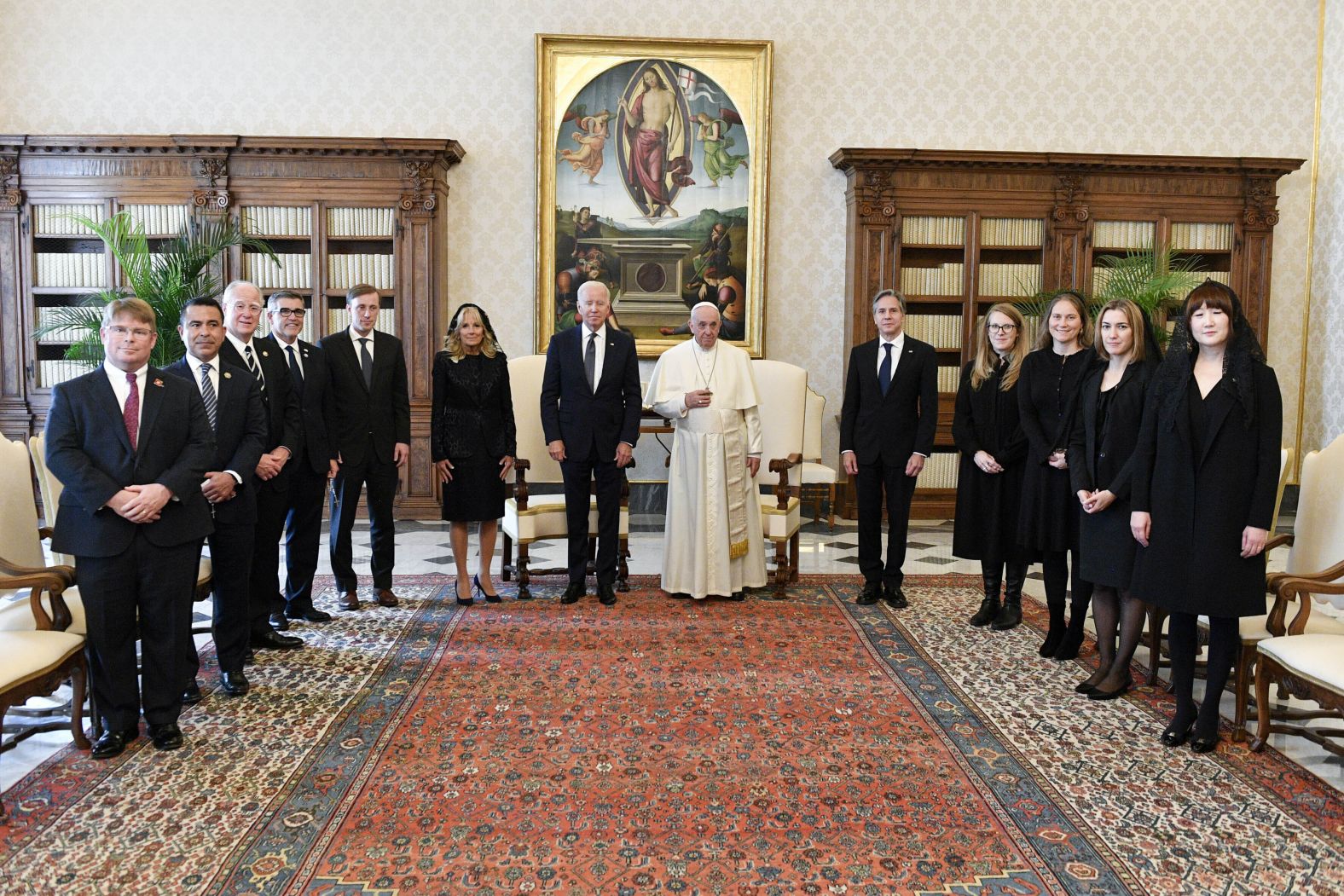 Biden, first lady Jill Biden, Secretary of State Antony Blinken and the rest of the US delegation pose for a photo with the Pope.