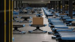 Robots sort and transport packages at the Amazon Air Hub at the Cincinnati/Northern Kentucky International Airport (CVG) in Hebron, Kentucky, U.S., on Monday, Oct. 11, 2021. 