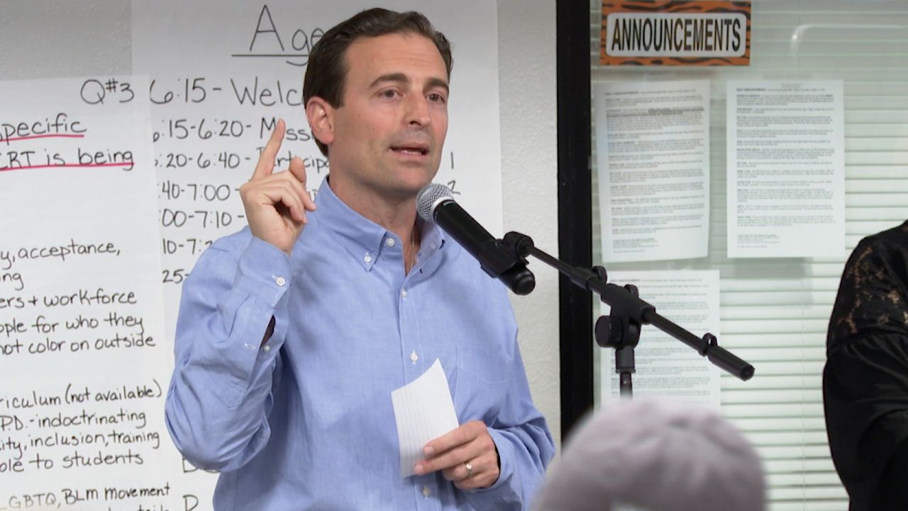 GOP Senate hopeful Adam Laxalt campaigned at the school board meeting, telling parents he would support them.