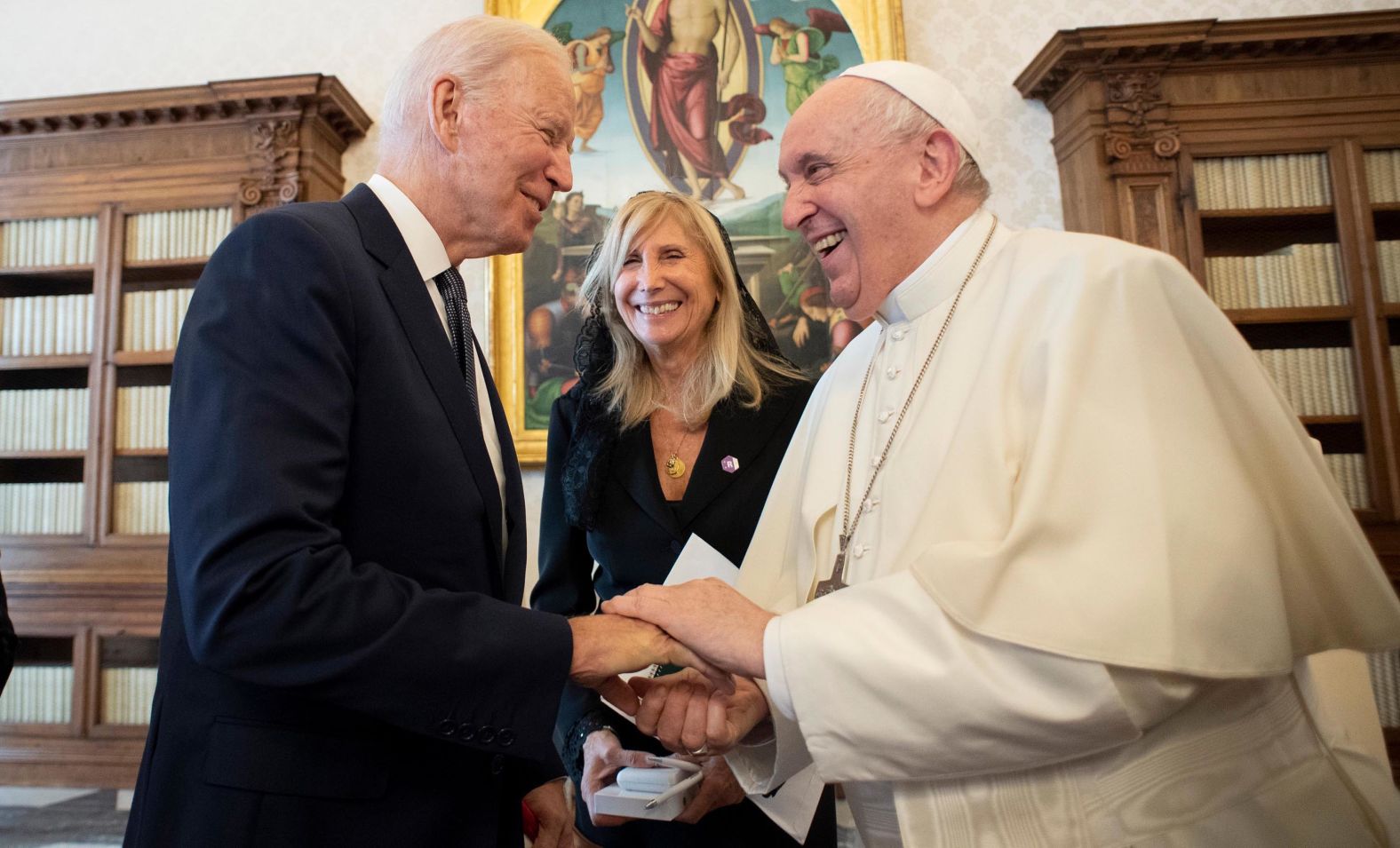 Biden gives Pope Francis a challenge coin during <a href="index.php?page=&url=https%3A%2F%2Fwww.cnn.com%2F2021%2F10%2F29%2Fpolitics%2Fpope-francis-joe-biden-meeting%2Findex.html" target="_blank">his trip to the Vatican</a> on Friday. "Now the tradition is — I'm only kidding about this — the next time I see you, if you don't have it you have to buy the drinks. I'm the only Irishman you've ever met who's never had a drink," Biden said to the Pope, who was laughing.