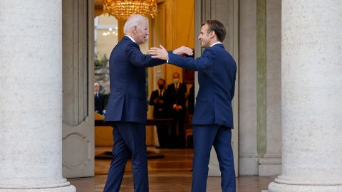 TOPSHOT - French President Emmanuel Macron (R) welcomes US President Joe Biden before their meeting at the French Embassy to the Vatican in Rome on October 29, 2021. (Photo by Ludovic MARIN / AFP) (Photo by LUDOVIC MARIN/AFP via Getty Images)