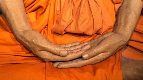 hands monk in meditation
