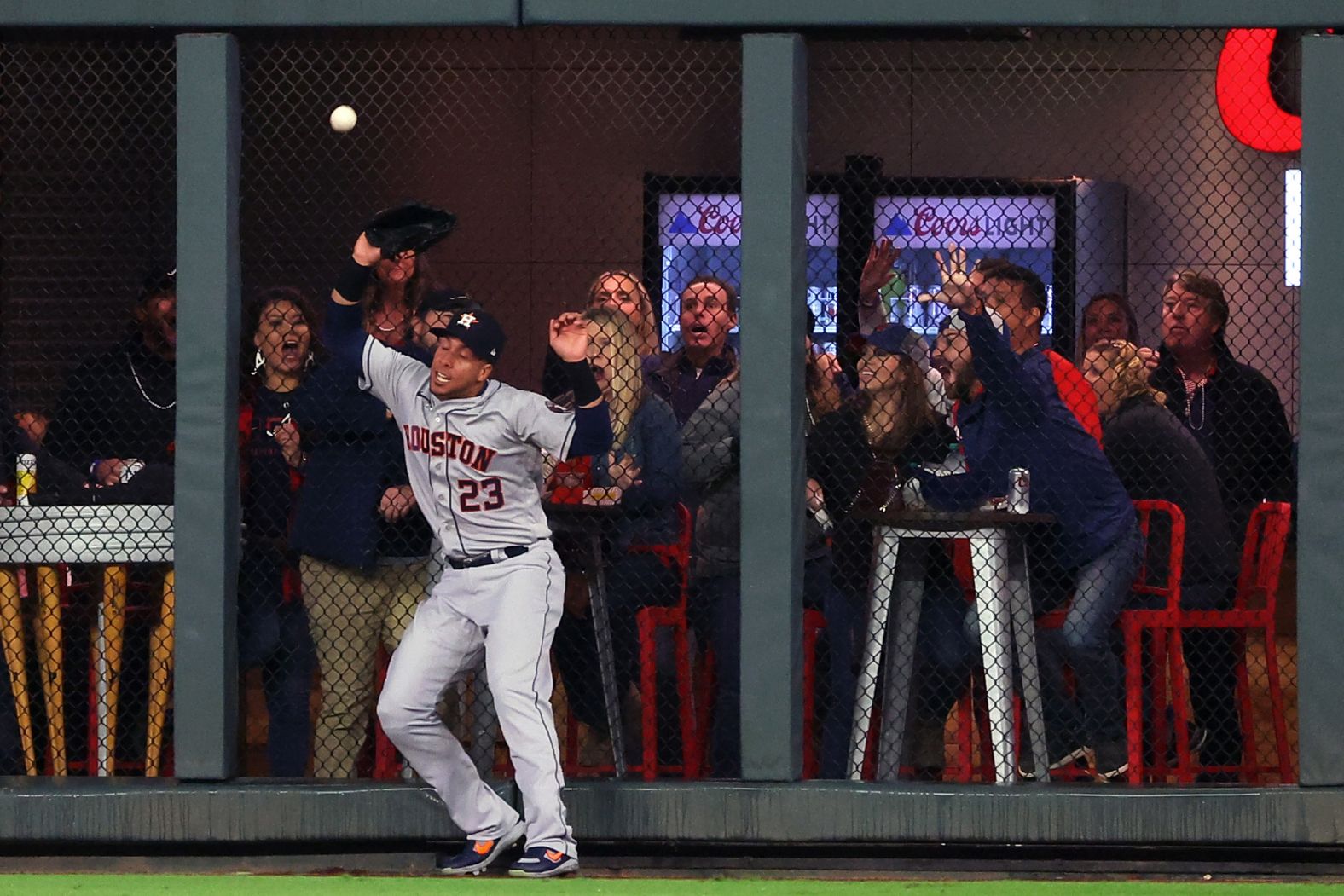 Michael Brantley of the Astros fails to catch a double, hit during the second inning.