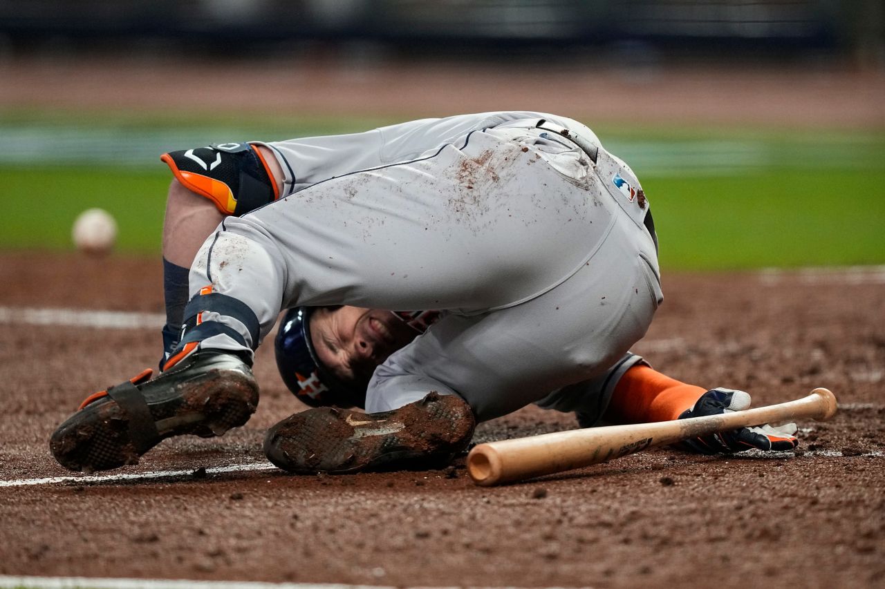 Astros' Alex Bregman reacts after getting hit by a pitch during the sixth inning.