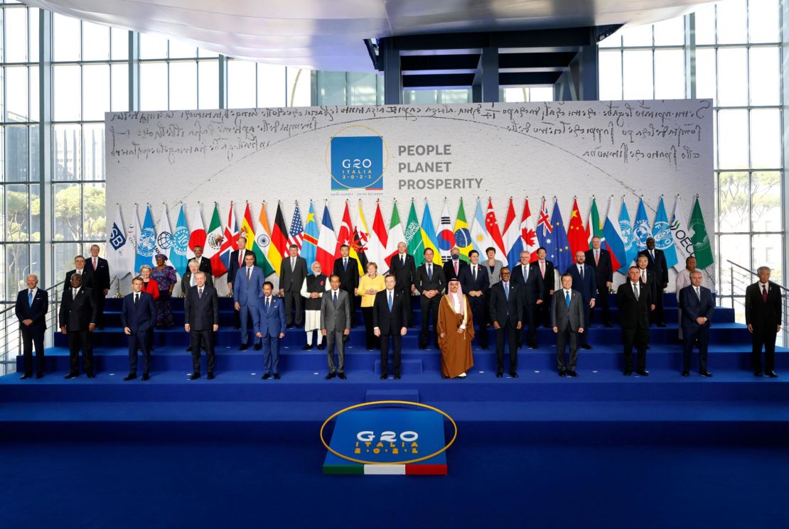 Italian Prime Minister Mario Draghi, center-front, stands with world leaders as they gather for the official family photograph on day one of the G20 summit at the convention center of La Nuvola, in the EUR district of Rome on Saturday, October 30, 2021