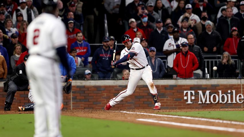 ATLANTA, GA - OCTOBER 30:  Austin Riley #27 of the Atlanta Braves hits a RBI double in the sixth inning during Game 4 of the 2021 World Series between the Houston Astros and the Atlanta Braves at Truist Park on Saturday, October 30, 2021 in Atlanta, Georgia. (Photo by Rob Tringali/MLB Photos via Getty Images)