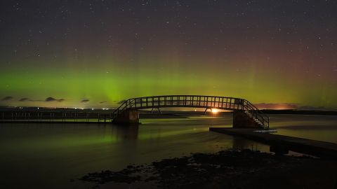 The northern lights are seen early Sunday in Dunbar, Scotland.