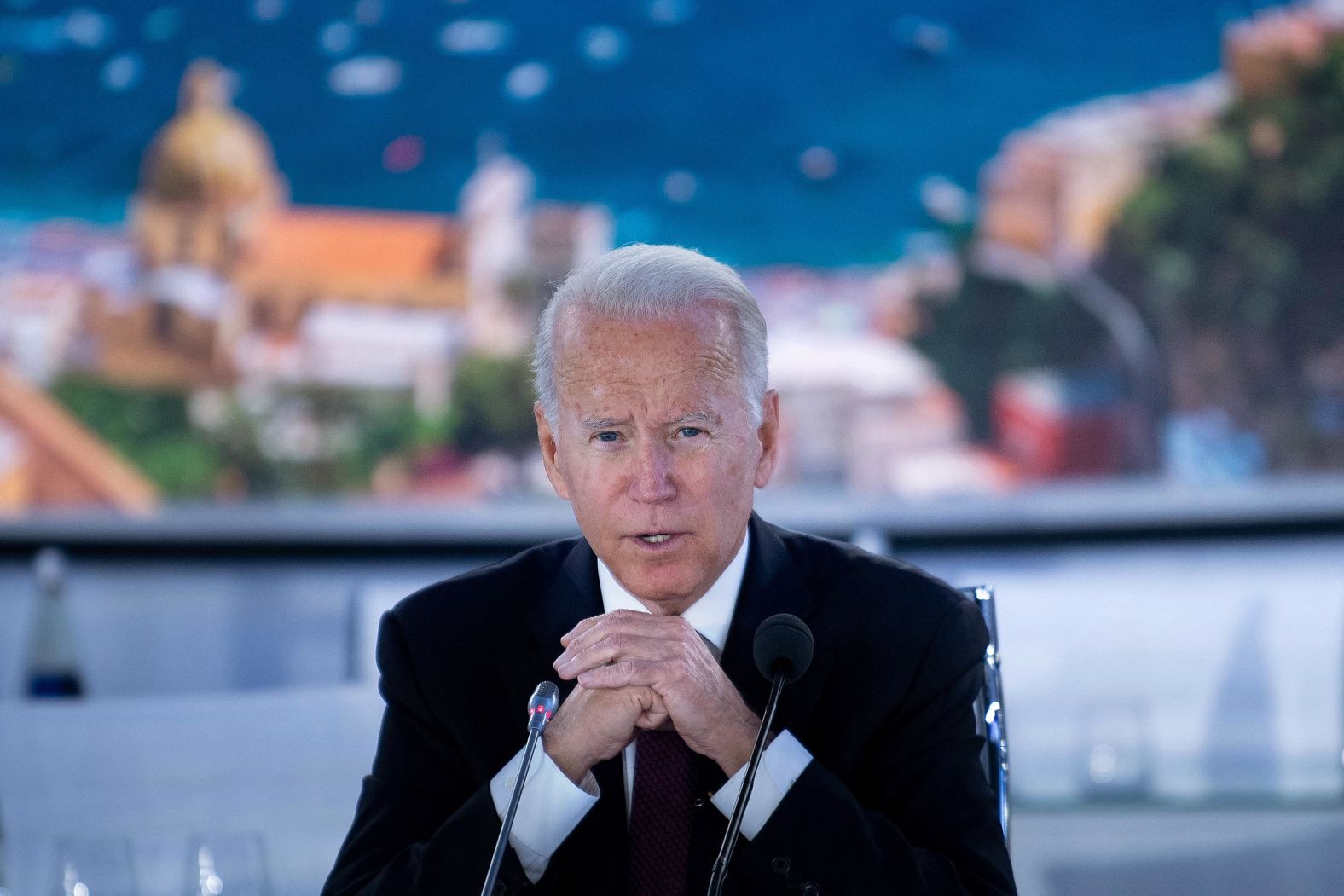 Biden speaks at the beginning of a meeting about global supply chains on Sunday.