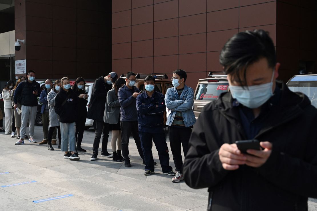 People line up to be tested for the Covid-19 coronavirus at a hospital in Beijing on October 29.