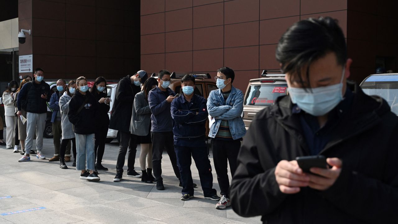 People line up to be tested for the Covid-19 coronavirus at a hospital in Beijing on October 29.